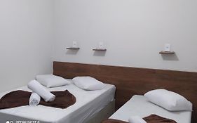 Pousada Quarto com ventilador,ar frigobar e garagem